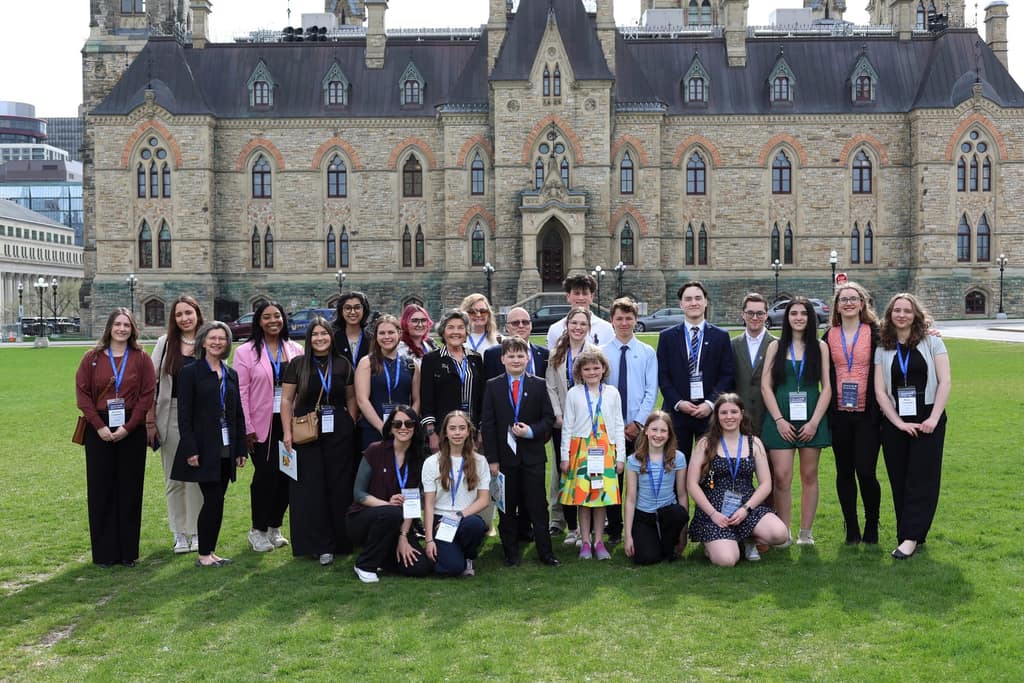 BreakthroughT1D delegates in a group photo of people outside the Canadian parliament buildings in Ottawa